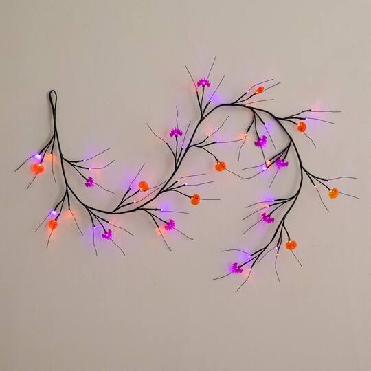 6.5ft. Artificial Halloween Twig Garland with 57 Orange and Purple LED Lights